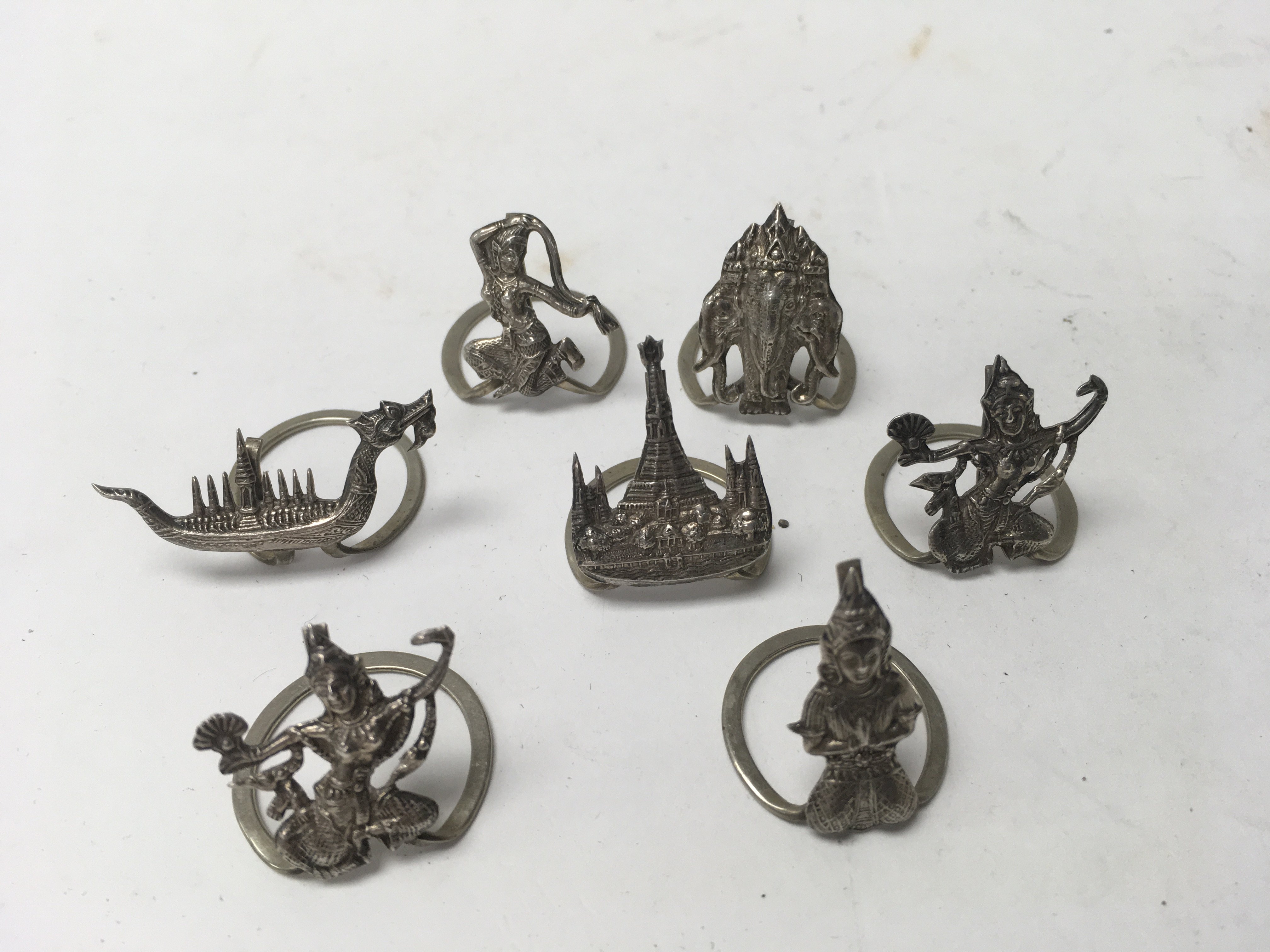 7 Thai sterling silver menu holders.