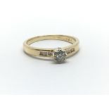 An 18ct yellow gold and diamond solitaire ring, approx 0.20ct, size approx M/N