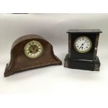 Two mantle clocks comprising an eight day French example and a black slate clock (2).