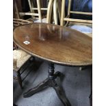 A late Victorian occasional table with an oval top and turned column - NO RESERVE