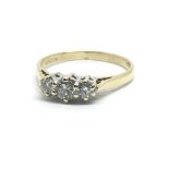 An 18ct yellow gold three stone diamond ring, approx 0.25ct, ring size approx O/P