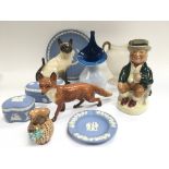 A collection of ceramics including a Beswick fox,