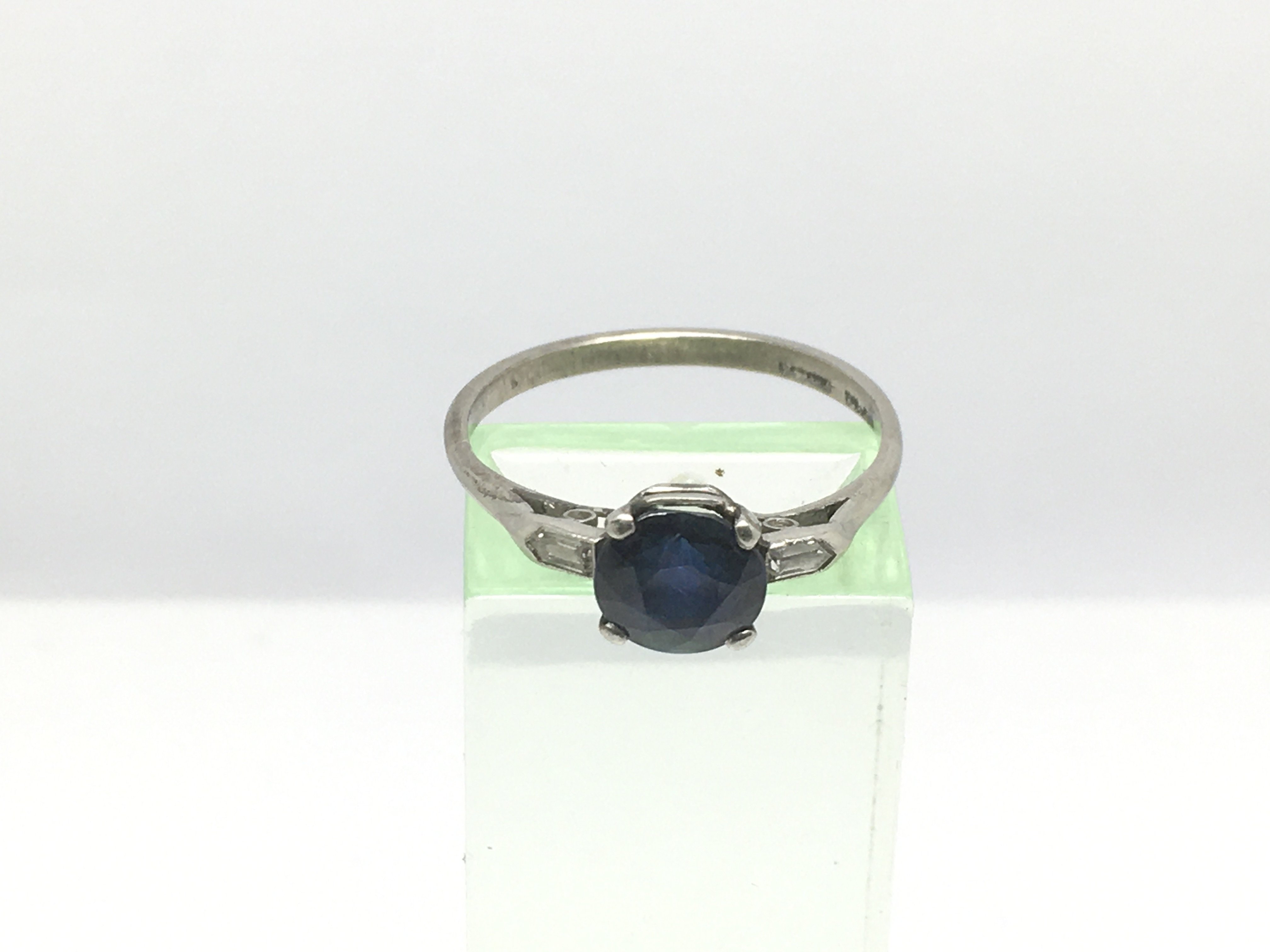 A sapphire and diamond ring, approx 3g and approx size S.