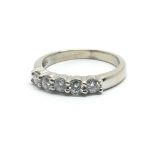 An 18ct white gold and five stone diamond ring, approx 0.5ct, ring size approx M