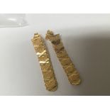 A pair of 22carat gold (916) earrings with vertical alternating drops weight 8g