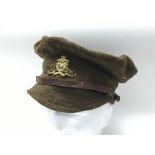 British WW1 style soft Trench cap , Artllery badged , in unissued condition.