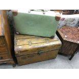 A large vintage painted shipping chest, plus a gre
