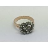 An unmarked rose gold and diamond ring, approx 4.1g and approx size M.