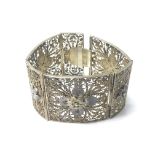 A 1920s white metal (tested silver) filigree bracelet.