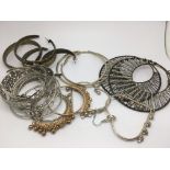 A collection of vintage large hoop earrings.