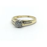 An 18ct yellow gold ring, having central solitaire diamond and diamond shoulders, approx 0.5ct, ring