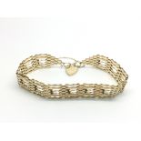 A 9ct gold gate bracelet, approx 6.8g.