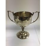 A silver trophy cup, Birmingham hallmarks, approx total height 17cm and approx weight 284g.