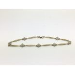 A 9ct gold bracelet set with diamond chips, approx 4g.
