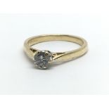 An 18ct yellow gold and single diamond solitaire ring, approx 0.33ct, ring size approx L/M
