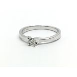 An 18ct white gold and diamond solitaire ring, approx 0.15ct, ring size approx L