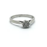 A platinum and diamond ring, the single stone approx 0.10ct, size approx N