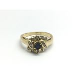 An 18ct gold sapphire and diamond ring, approx 3.4g and approx size L.