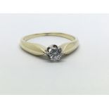 A 14ct yellow gold and solitaire diamond ring, approx 0.20ct, ring size approx M