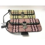 2 Burberry tartan wool weave clutch bags.