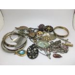A collection of vintage costume jewellery items.
