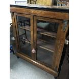A Victorian inlaid walnut pier cabinet with gilt metal mounts and double doors 90x30cm