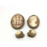 Two shell cameo brooches and a pair of cameo earrings.