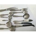 A Georg Jensen stainless steel cutlery set 8 place setting comprising knifes forks soup spoons