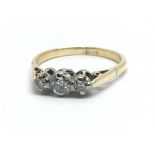 An 18ct yellow gold and three stone diamond ring, approx 0.33ct, ring size approx Q