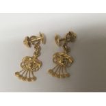 A pair of high grade gold earrings possible 22carat gold with open five point drops. Weight 3g