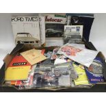 A box of motoring related ephemera including magazines, brochures, posters, luggage labels etc.
