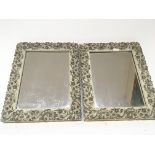 A pair of small 20th century mirror of rectangular shape with raised gilt scrolls 25x32cm - NO
