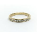 An 18ct yellow gold and diamond half eternity ring, ring size approx K