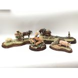 Four Border Fine Art sculptures of animals including Last to Finish, Stout Hearts and two others