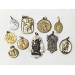 A collection of ten St Christopher pendants, four rolled gold and six others