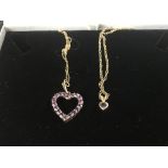 2 9ct gold purple stone set pendants and chains.