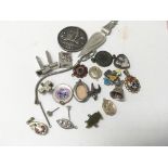 A hallmarked silver medal, silver bookmark and a collection of small jewellery items.