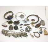 A collection of vintage and antique costume jewellery.