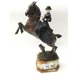 Maximillian Fiot, (1886-1953) gilt bronze figure of a horse and rider, signed Fiot. mounted on a