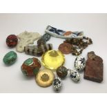 A collection of various Chinese beads and hardstone items.