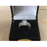 A 9ct white gold and diamond set cluster ring, (approx 4.5g)