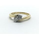 An 18ct yellow gold two stone diamond ring, approx 0.30ct, ring size approx K/L