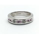 A 9ct white gold ring with diamonds and pink coloured stones, ring size N