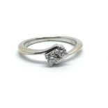 An 18ct white gold and two stone diamond ring, approx 0.15ct, ring size approx L