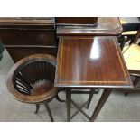 Two Edwardian mahogany jardiniere stands .