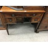 An Edwardian 3 draw desk with mahogany top.