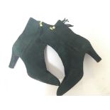 A pair of authentic Chanel green suede boots with gold tassel toggles size 39 UK 6 vertically as
