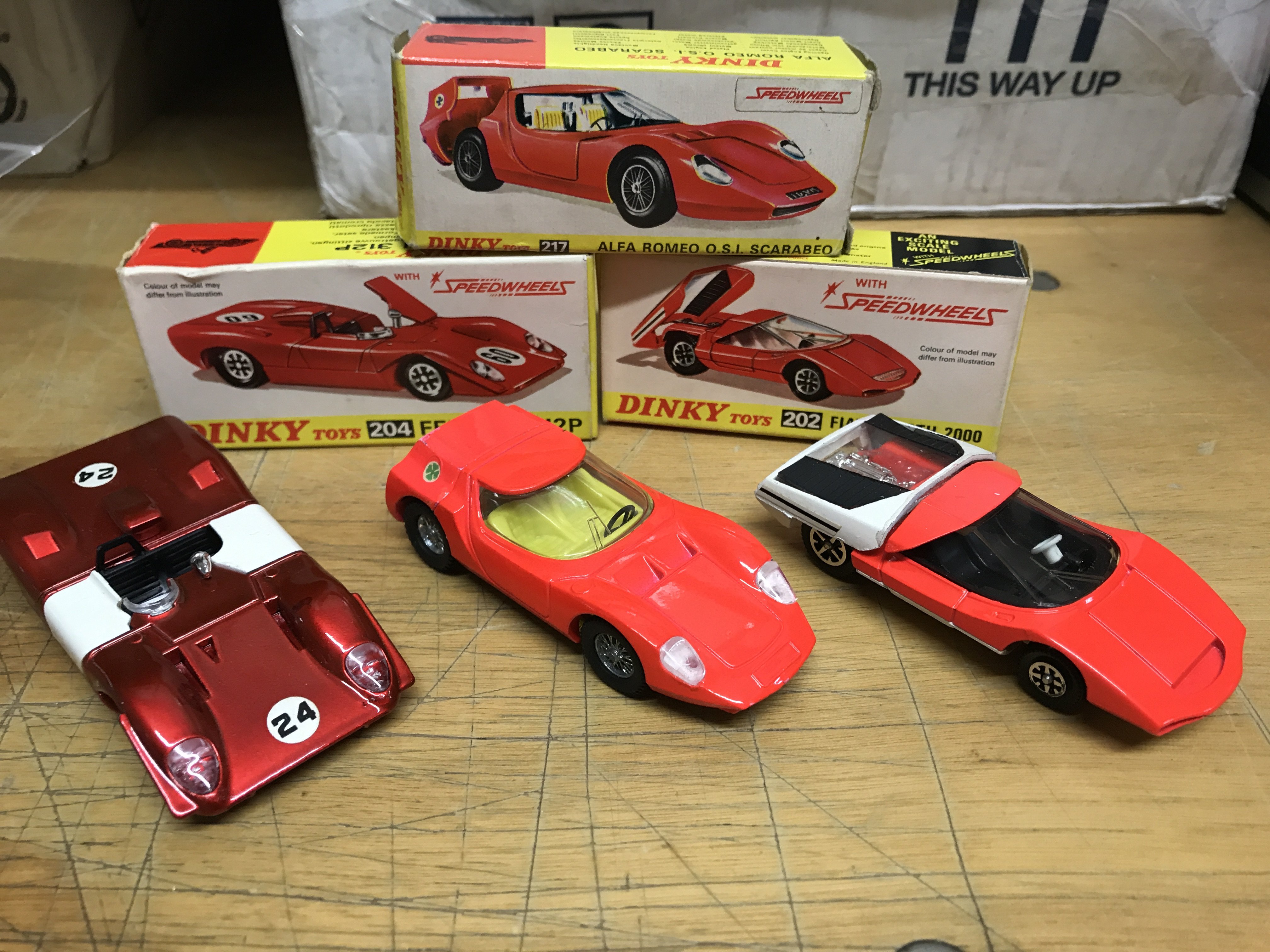 Dinky toys, #217 Alfa Romeo OSI Scarabed, #204 Ferrari 312P and #202 Fiat Abarth 2000, boxed