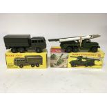 Dinky toys, #665 Honest John missile launcher and #818 All terrain military vehicle, boxed