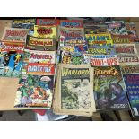 A box containing a collection of UK comics, including Marvel Superheroes, Avengers, Spider-Man and